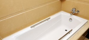How to Remove Adhesive from a Bathtub | DoItYourself.com