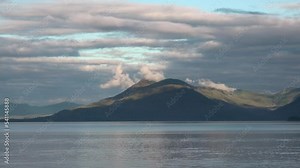 Beautiful cruise to Alaska. Beautiful canadian landscape, summer, sunset. North America. Sunset over the darkening mountains of the Inside Passage to Alaska.