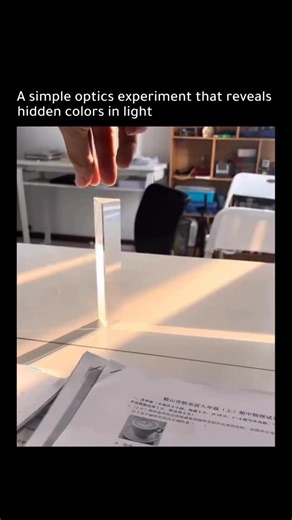 Nacho on Instagram: "This experiment reveals the science behind how white light is actually made of many colors. When a single beam of white light enters a glass prism, it slows down and bends, a process called refraction. Because each color in white light has a different wavelength, each one bends by a different amount as it passes through the glass. Red light bends the least, while violet bends the most. As the light exits the prism and bends again, these small differences spread the colors ap