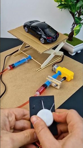 Mini hydraulic car lift by DC motor