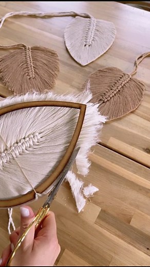 Macrame| Jute| craft ✂🪢 on Instagram: "A little boho touch with handmade macrame feathers 🌿🤍 #macramelovers #macramedecor #bohohomedecor #macramewallhanging #homedecorusa #macramefeather #bohofeather #macramedesign #handmadefeather #feathermacrame #macrameleaves #diymacramé #diylovers #smallbusiness"