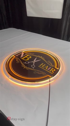 Acrylic backlit round sign, designed to enhance storefront branding. Clean acrylic surface, warm halo backlighting, and stable LED illumination. A practical and durable signage solution for salons and modern commercial spaces. Web: www.retaysign.com #BacklitSigns #AcrylicSign #RoundSignage #LEDSignage #RetaySigns