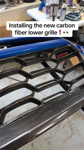Installing the new carbon fiber lower grille
