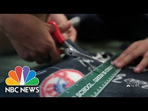 5th grade class making blankets for children in need