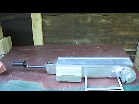 Linear to rotary motion converter