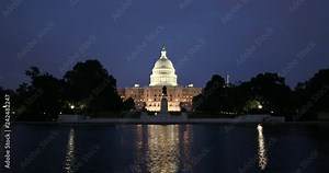 United States Capitol and the Senate Building over the reflecting pool at night in Washington DC USA vídeo do Stock