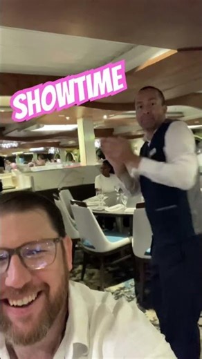 Showtime in the main dining room on the Carnival Elation