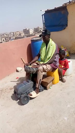 Engaging Rooftop Playtime with Toy Lawn Mower
