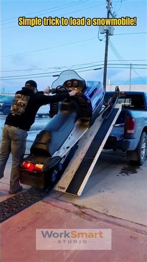 Snowmobile Loading Trick by Skilled Driver: Ramp Guiding and Easy Pickup Truck Loading Process