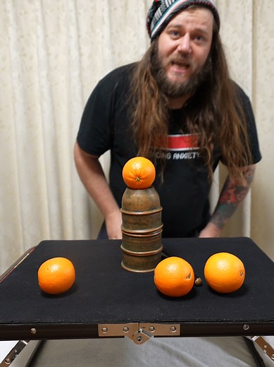 Cups and Balls Magic Trick Explained by Street Magician