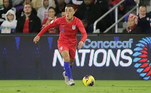 What does Barcelona get after signing Sergiño Dest?