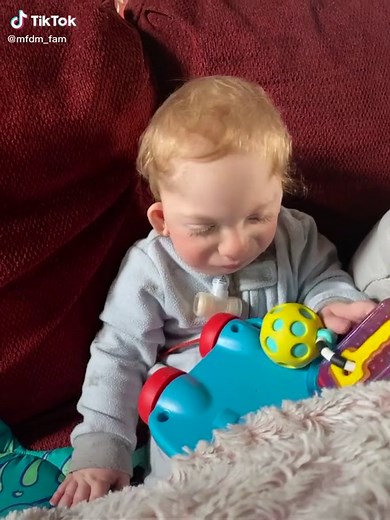 Playing with some toys 🤪#rarediseaseawareness #mfdm #mandibulofacialdysostosiswithmicrocephaly #mfdmbaby
