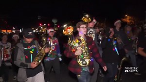 After a tragic accident left a high school band director and bus driver dead, the Andrews, Texas community was unsure if their annual holiday parade would go on. But the band and 1,400 students from all over west Texas came together to spread some holiday cheer. | NBC Nightly News with Tom Llamas