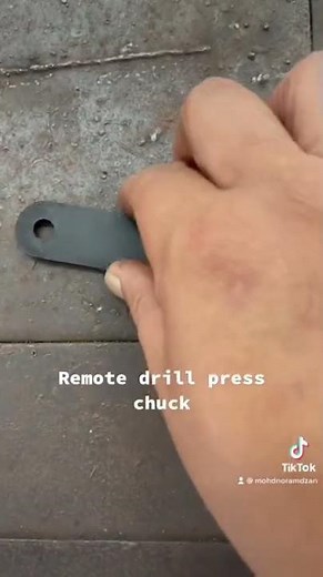 Remove drill press chuck