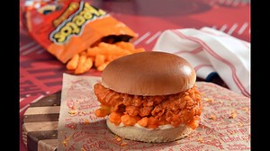 KFC is going to put Cheetos on a chicken sandwich and we are most definitely here for it