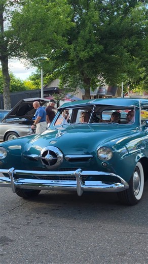1950 Studebaker Champion cruising by during Back to the 50's car show