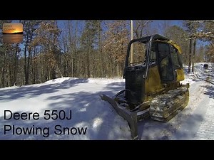 John Deere 550J Dozer Plowing Snow!