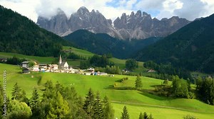 Dolomites Italy landscape at Santa Maddalena or St. Magdalena village at foot of Ruefen Mountain. The beautiful mountain landscape attracts tourist to Dolomites travel in Northern Italy.