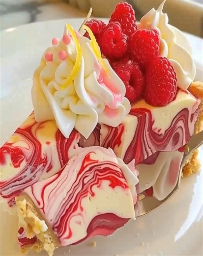 27K views · 299 reactions | Luscious Raspberry Cheesecake Creamy, tangy, and irresistible! The ultimate cheesecake recipe for family dinners or parties.—save this recipe today! #CheesecakeRecipes #RaspberryDesserts #EasyBaking #FruitDesserts #SweetTreats | Optimal Recipes | Facebook