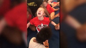 Police investigating after video shows sobbing cheerleaders being forced to do the splits