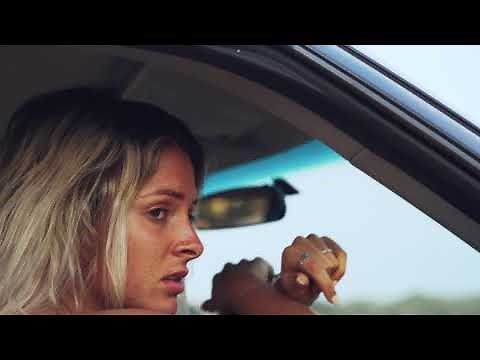 Young Upset Woman Sitting in her Car (Emotional Stock Footage)