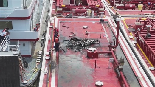 2 dead after helicopter crashes into Mississippi River barge north of St. Louis