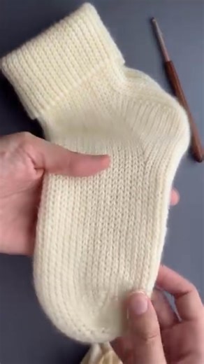 Cold feet? Not anymore! Make your own warm, handmade socks with this Crochet Pattern With clear instructions and simple stitches, this pattern is perfect for cozy nights and winter crafting. ✔ Easy-to-follow ✔ Detailed photo guide ✔ Fits all sizes ✔ Instant PDF download Click “Shop Now” and start your cozy project today! | Yarncrochet