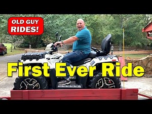 Unloading Polaris Sportsman Touring 1000 XP from trailer and first ride.