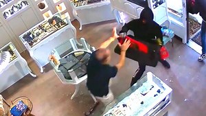 Jewelry store owner fights men with sledgehammers