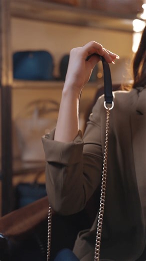 Introducing our newest icon. Designed to carry the essentials and all the compliments. With its sleek chain straps and luxe detailing, this bag is crafted to be noticed. | HUB