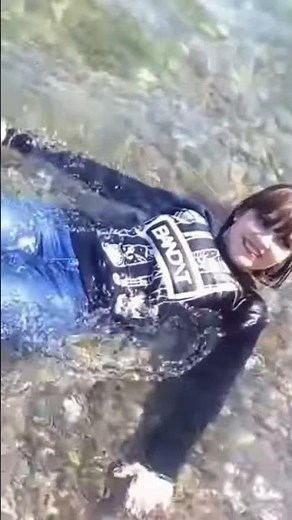 WETLOOK STORIES JUST FOR YOU! BEAUTY WETS ALL HER CLOTHES IN THE SEA AND POSE GREATLY IN THE WET!