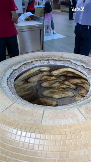 Warm Bread Made Over the Fire on a Wall of Tonir