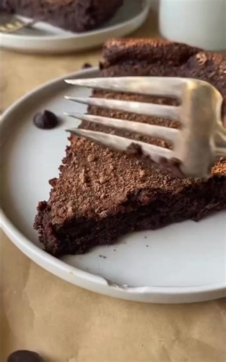 Comment RECIPE for the full recipe! This Flourless Chocolate Torte is a chocolate lover's fantasy. Intense flavor with a silky-smooth texture that everyone will absolutely adore! ½ cup unsalted butter 1 ¼ cups chocolate chips ¾ cup granulated sugar ½ tsp sea salt 1 tsp vanilla extract 3 eggs 1 egg yolk ½ cup cocoa powder ½ cup cold heavy cream | Organically Addison