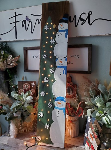 22K views · 346 reactions | Adding lights to my hand painted snowman sign ✨️☃️ full tutorial for painting this sign will be down below! Have a beautiful Saturday Y'all! #snowmandecor #snowmanseason #handpainted #christmaspainting #snowmancraft #handmadechristmas #rusticchristmas #porchdecor #porchsign #giftideas #handmadegifts #howto | Love Crafted Decor | Facebook
