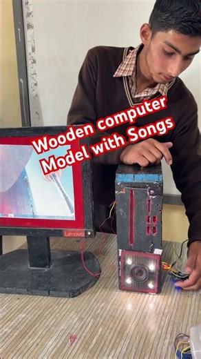 Wooden Computer model with songs