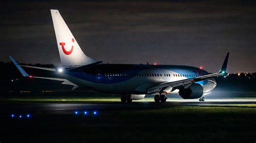Night landing caught on camera with runway turn