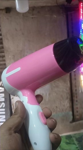 This is a Kemei KM-6830 hair dryer. Engineered for different hair types.Features an on/off switch,