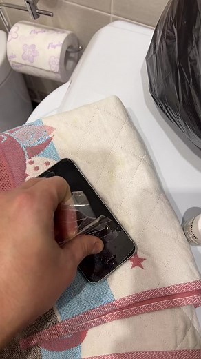 Repairing a Cracked Smartphone Screen with Protective Film