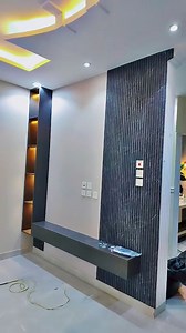 1.2K views | #tv cabinet design #wall cabinet design #wall cupboard #wall showcase #kitchen cabinet #folding door #ceiling design #wall paneling | New Western Interior & Decoration. | Facebook