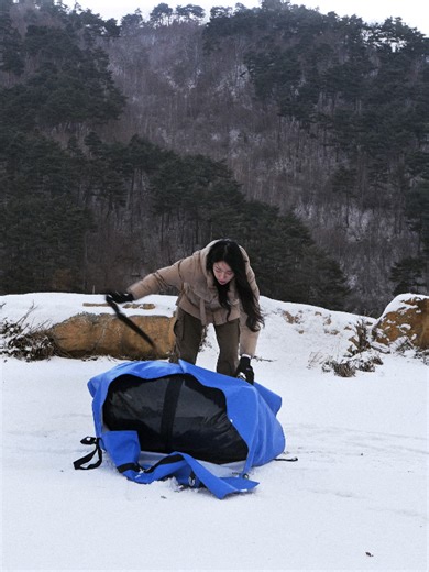 Camping Alone in a Snowstorm with an Inflatable Tent