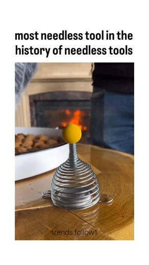 Films | Movies | Tv series on Instagram: "This X post showcases a spring-loaded stainless steel walnut cracker, where a gloved hand inserts a walnut into its coiled base, presses the yellow top to snap the shell cleanly, and removes intact nut halves without mess. Shared by @specializedtooI , an account highlighting purpose-built gadgets, it amassed 3,500 likes and 1.2 million views by February 2024, sparking replies from amused critics calling it needless to helpful users sharing Amazon purchas