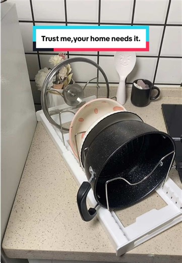Kitchen chaos meeting its match! Discover the ultimate space-saving solution for your cookware collection.🥳 #cookwareset #kitchenessentials #KitchenHacks #kitchenorganization #declutterwithme