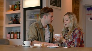 Young couple interacting with each other in cafe 4k | Premium Stock Video Footage