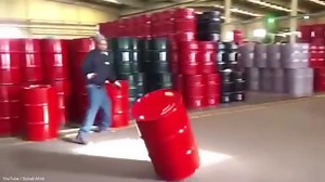 Barrel trick: Skilful man shows how to move barrels stress free | Daily Mail Online