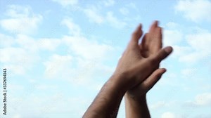 Man clapping hands to healthcare professionals for their work against coronavirus