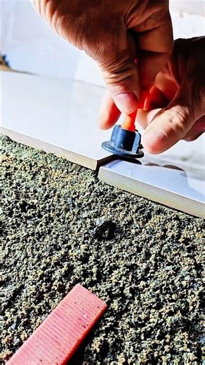 How to Use a Reusable Tile Leveling System