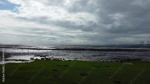 High Angle View of Severn Village at River Severn Which connects England and Wales Via Long Bridge, United Kingdom. May 27th, 2024