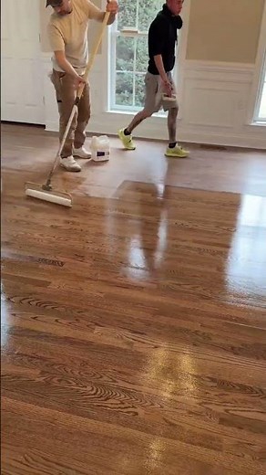 Applying Bona Traffic HD — we repeat this process four times to maximize durability and ensure a lon