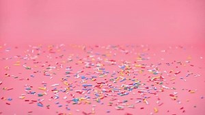 Colorful Sprinkles Falling On Pink Background Stock Footage Video (100% Royalty-free) 3411930561 | Shutterstock