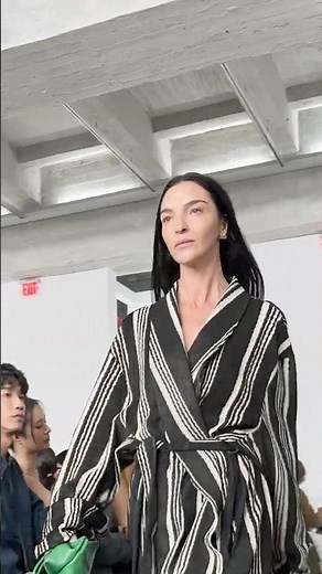 Look 49. Mariacarla Boscono in Calvin Klein Collection SP26. Laser-cut leather resembles terrycloth.